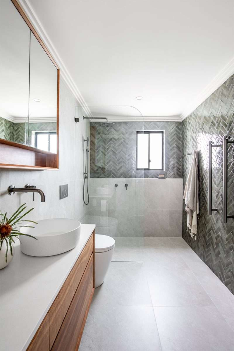 Designing with Distinction A Deep Dive into Carrara Herringbone Tile