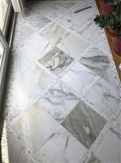 The Craftsmanship Behind Hand-Clipped Calacatta Gold Calcutta Marble Tiles