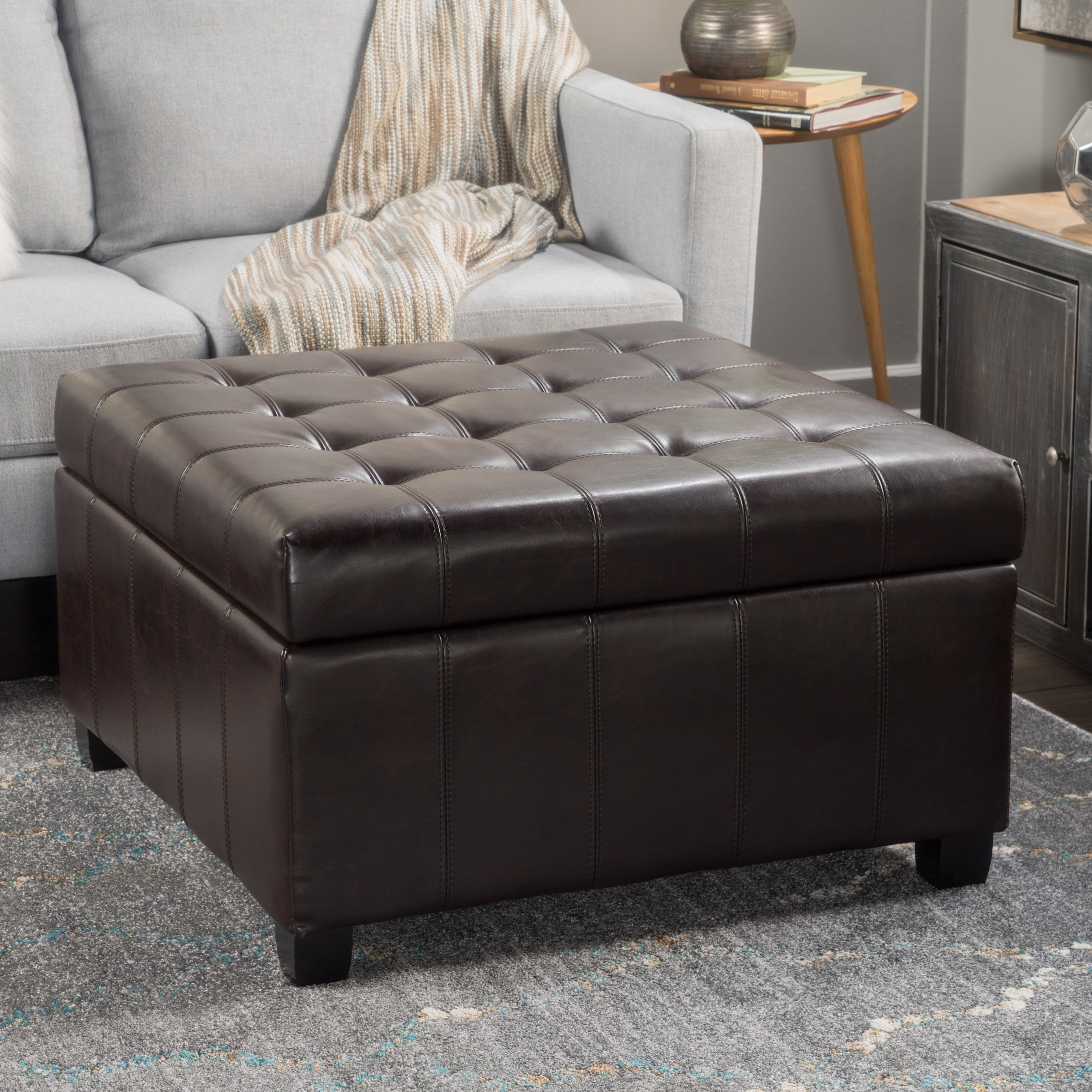 How tufted bonded leather ottomans balance comfort and style in living rooms