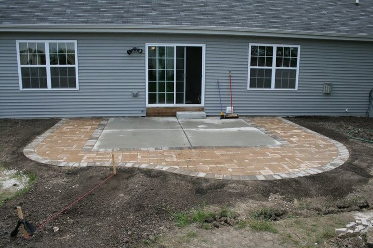 extend concrete patio with pavers