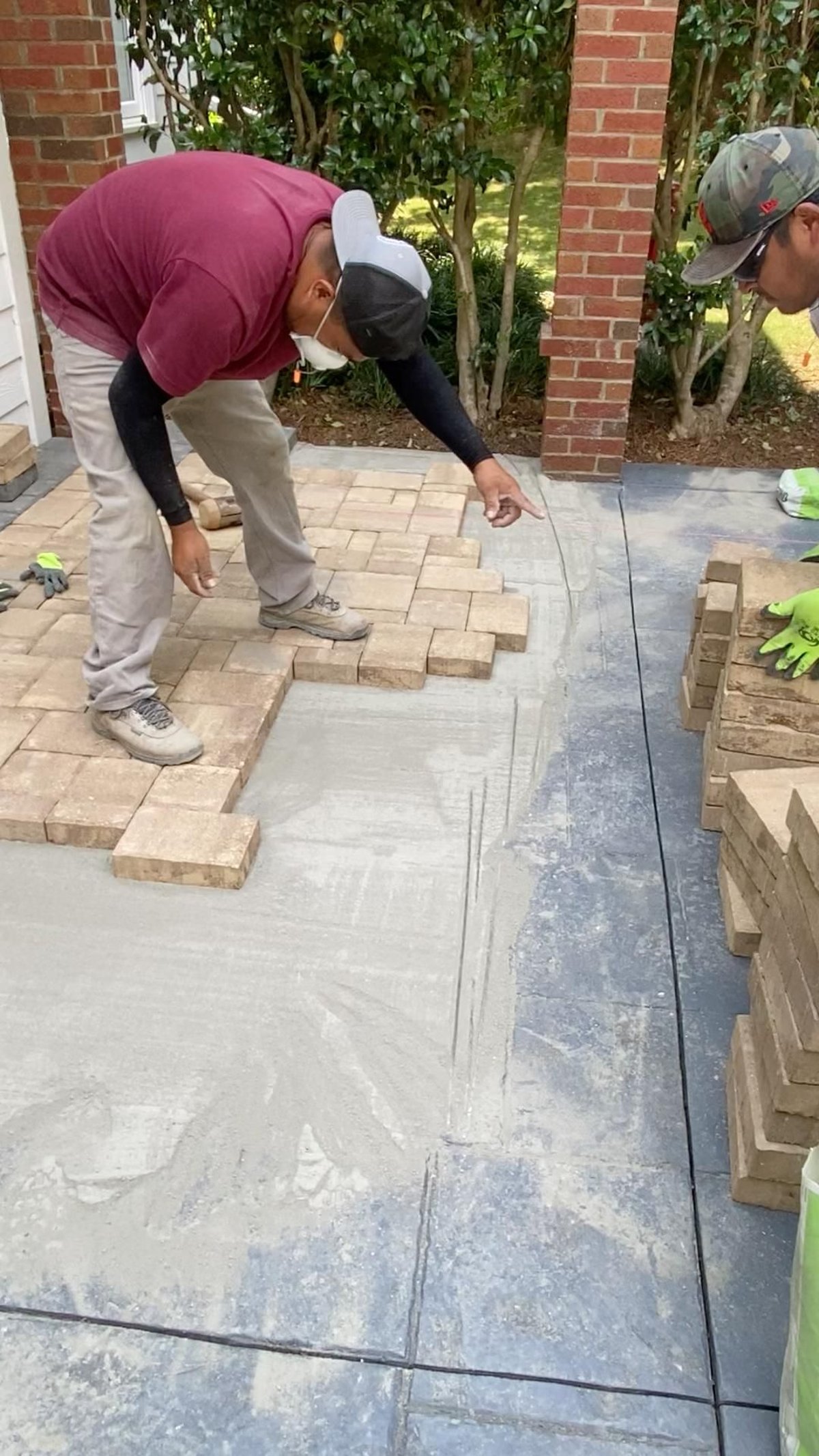 putting pavers on top of concrete