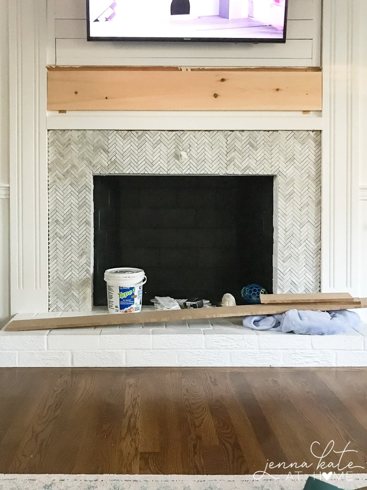 tile over a brick fireplace