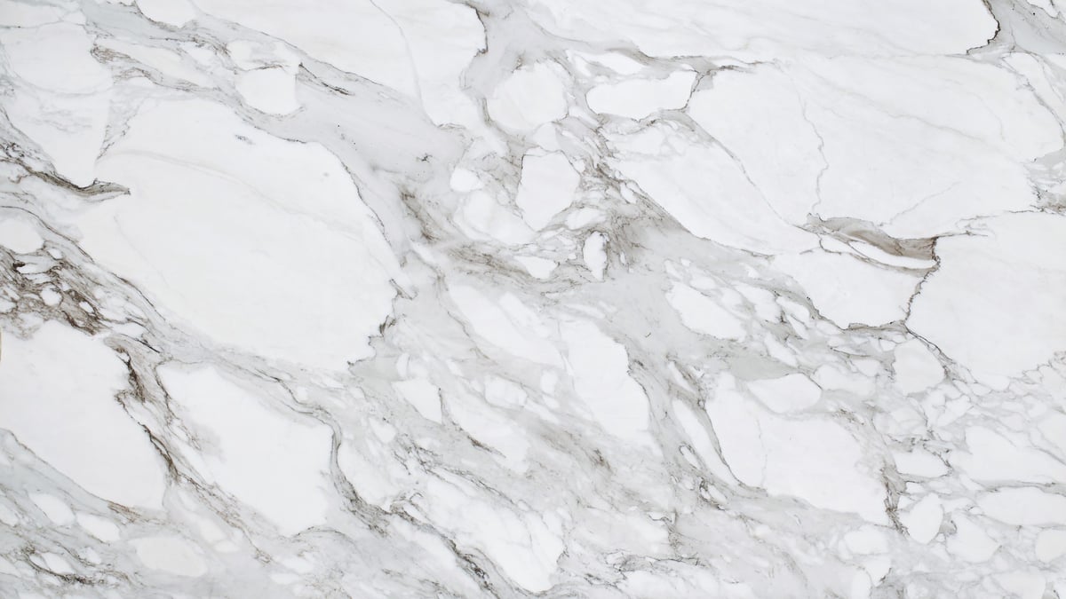 Bringing Warmth to Your Space with Tumbled Calacatta Gold Marble