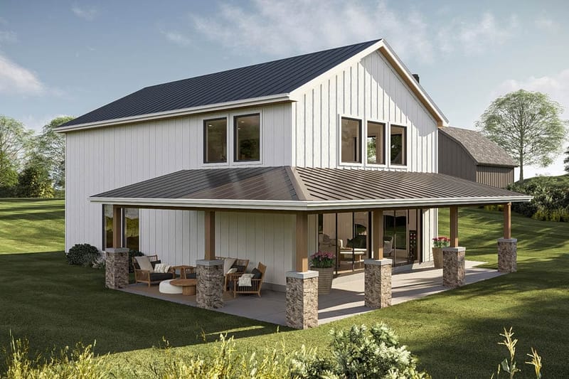 2 story barndominium with wrap around porch 2