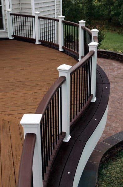 brown deck with white railing 2