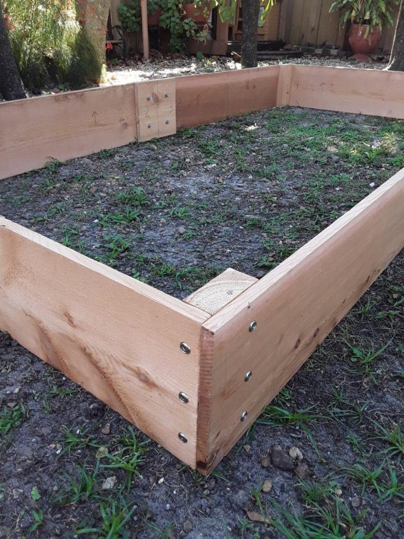 Building a Beautiful and Functional Cedar Plank Raised Bed Garden 2