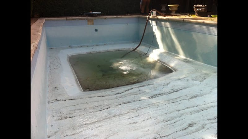 calcium deposits on bottom of pool 5