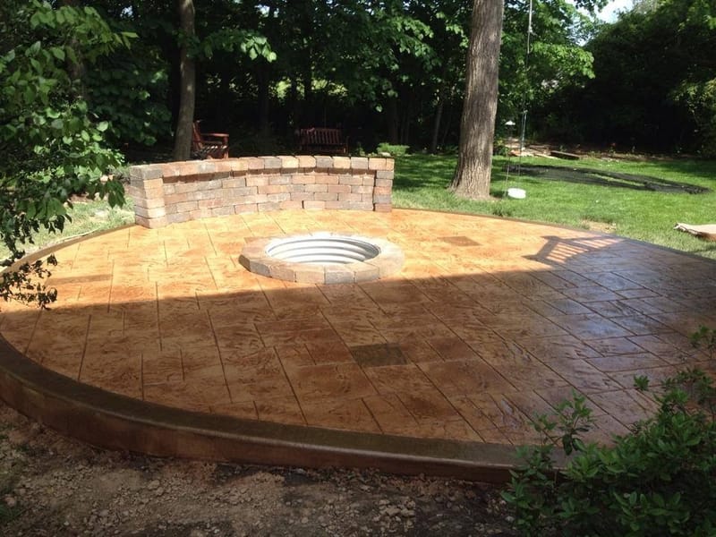 Crafting Your Dream Backyard Oasis with Stamped Concrete and a Firepit 2