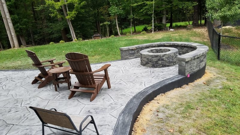 Crafting Your Dream Backyard Oasis with Stamped Concrete and a Firepit 3