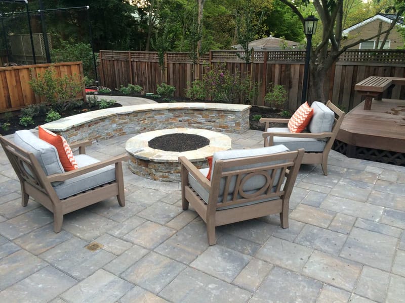 Crafting Your Dream Backyard Oasis with Stamped Concrete and a Firepit 4