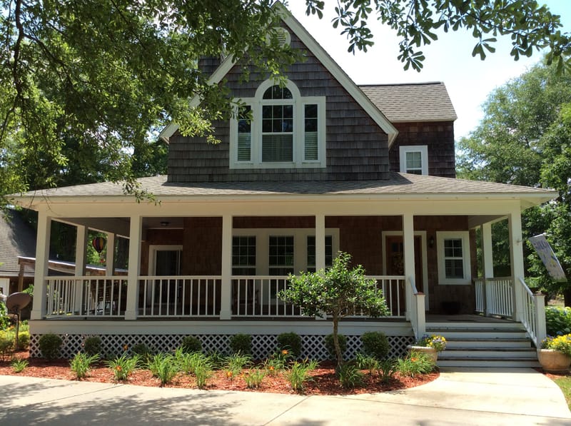 craftsman style house with wrap around porch 3