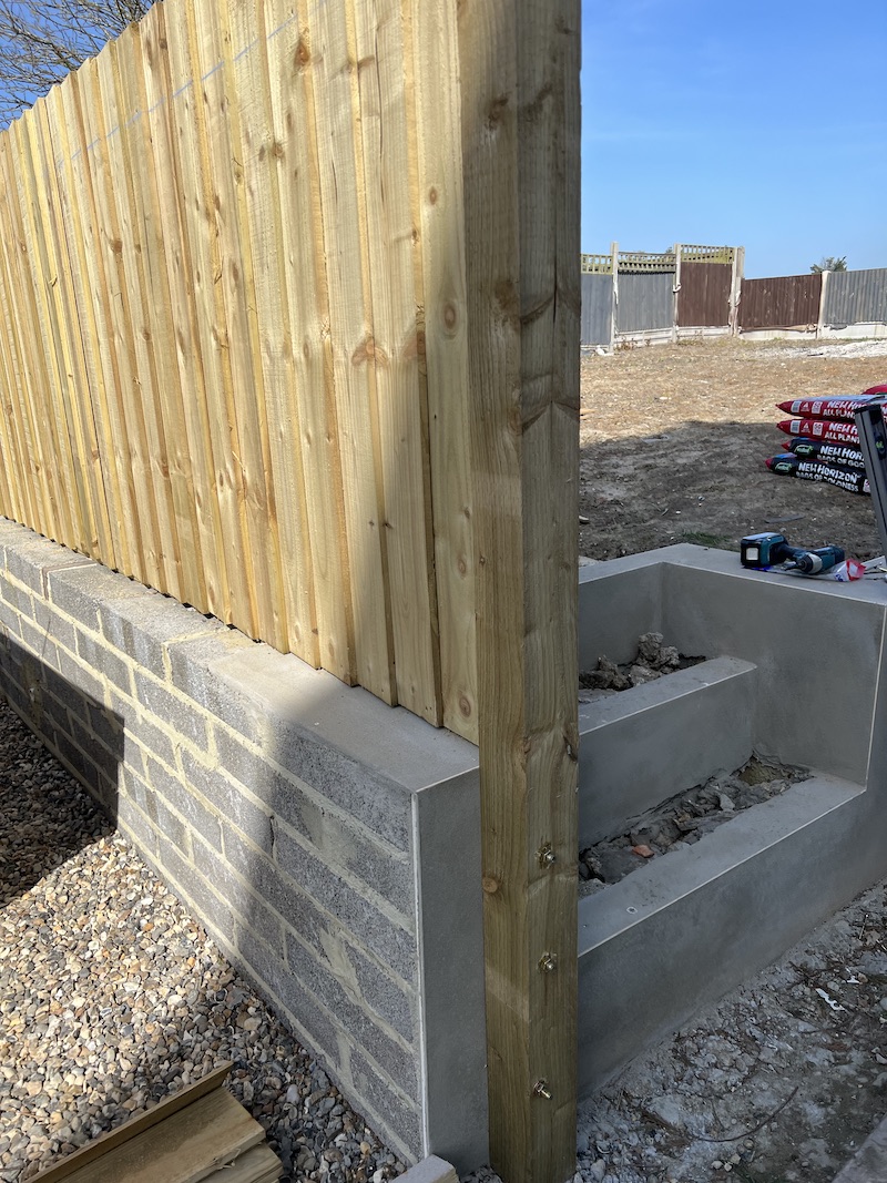 fence on top of retaining wall 5