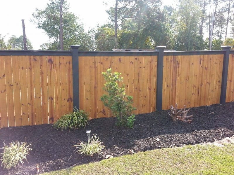 horizontal wood fence with black posts 3