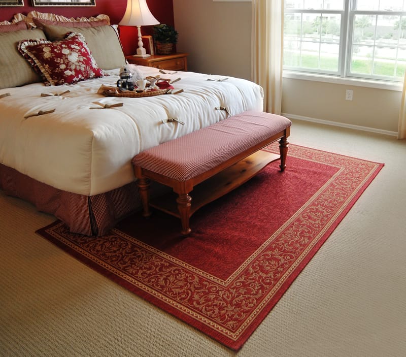 how to place area rug under bed 4