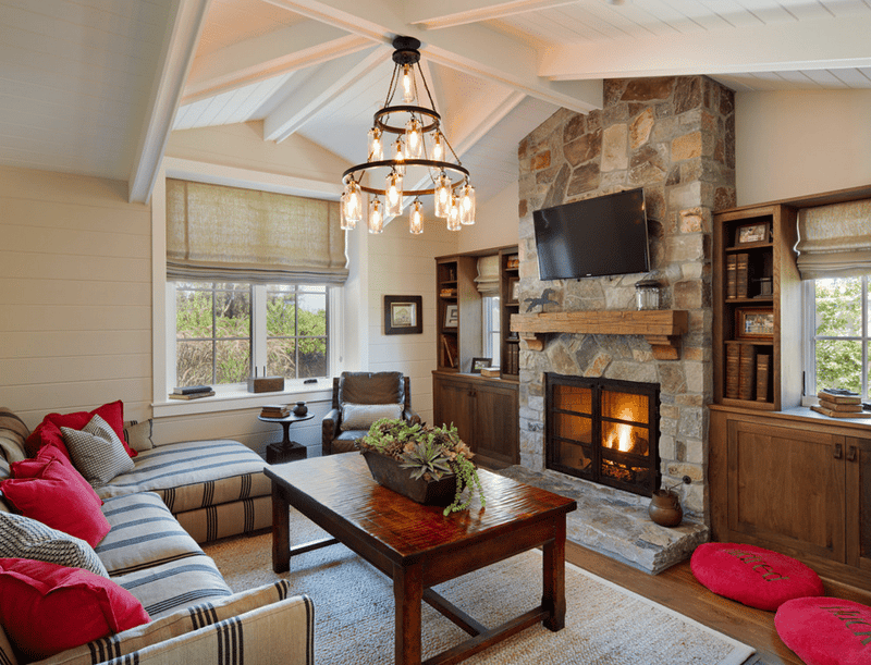living room with stone fireplace 1
