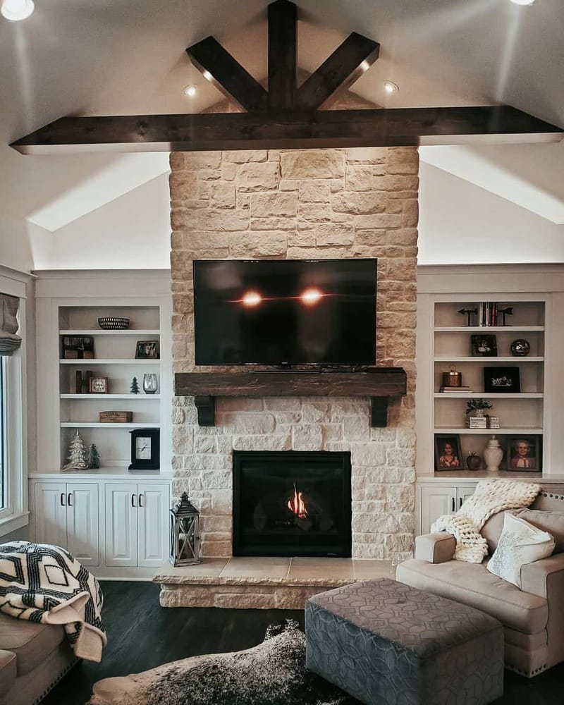 living room with stone fireplace 3