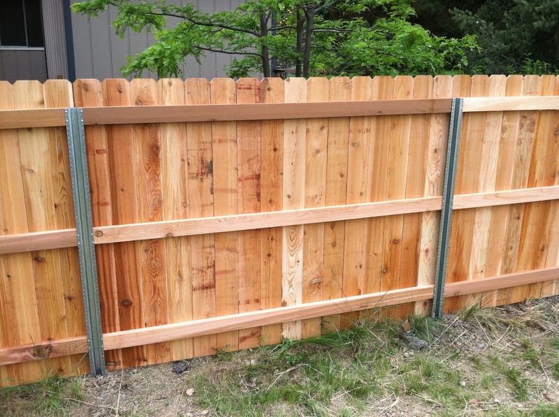 metal fence posts with wood fence 3