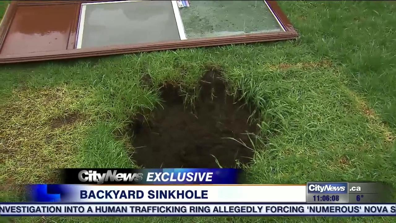 signs of a sinkhole in your yard 4