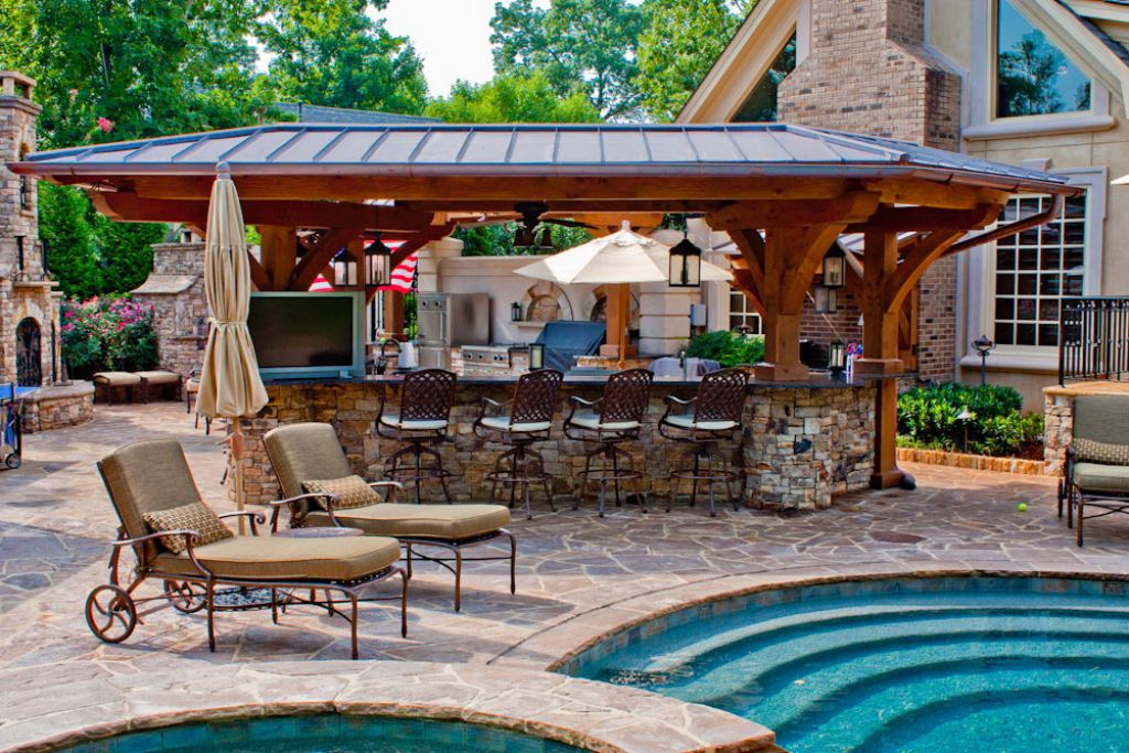 small backyard with pool and outdoor kitchen 4