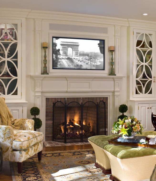 small living room with tv over fireplace 5