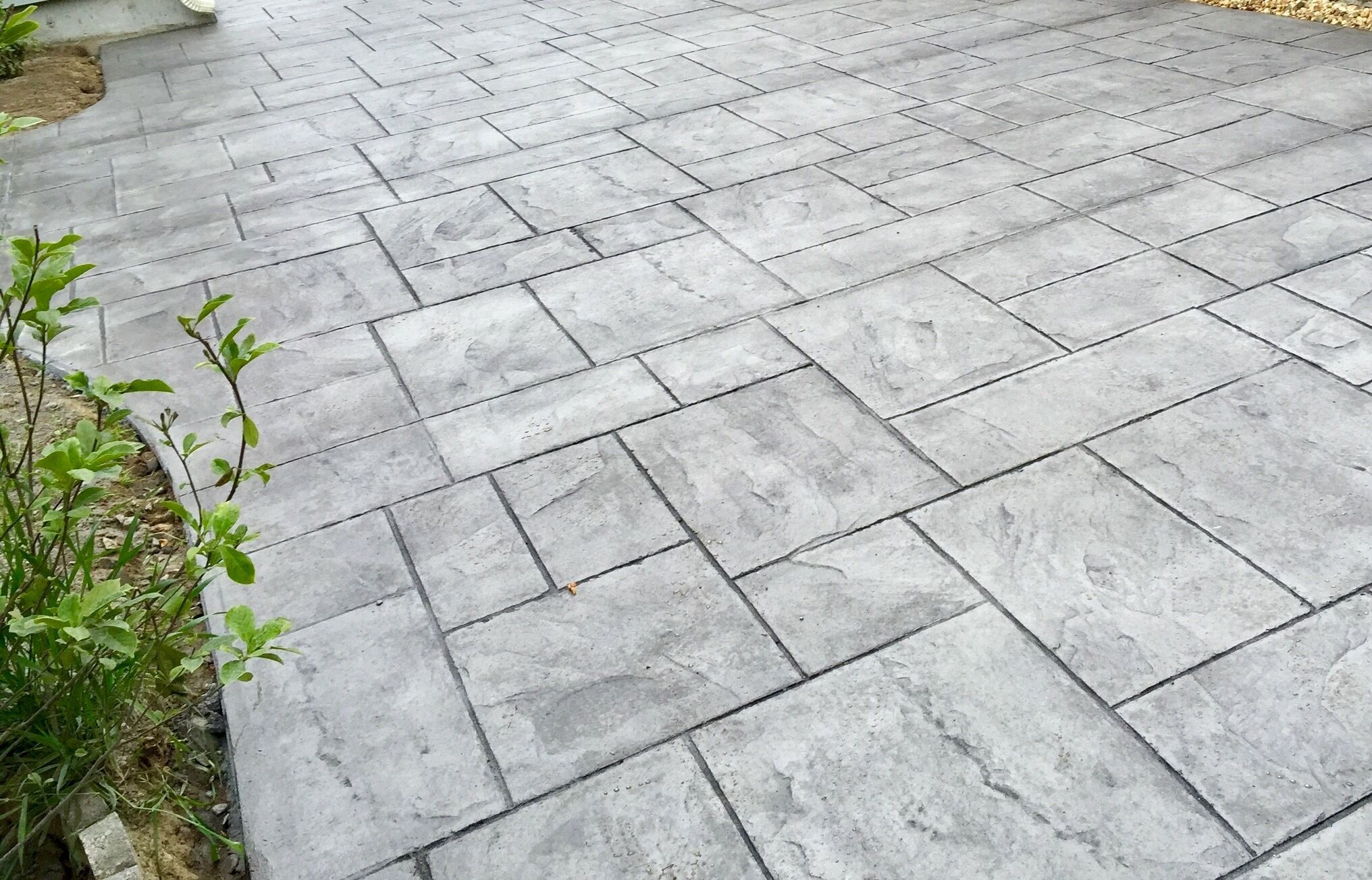 stamped concrete patio or pavers 3