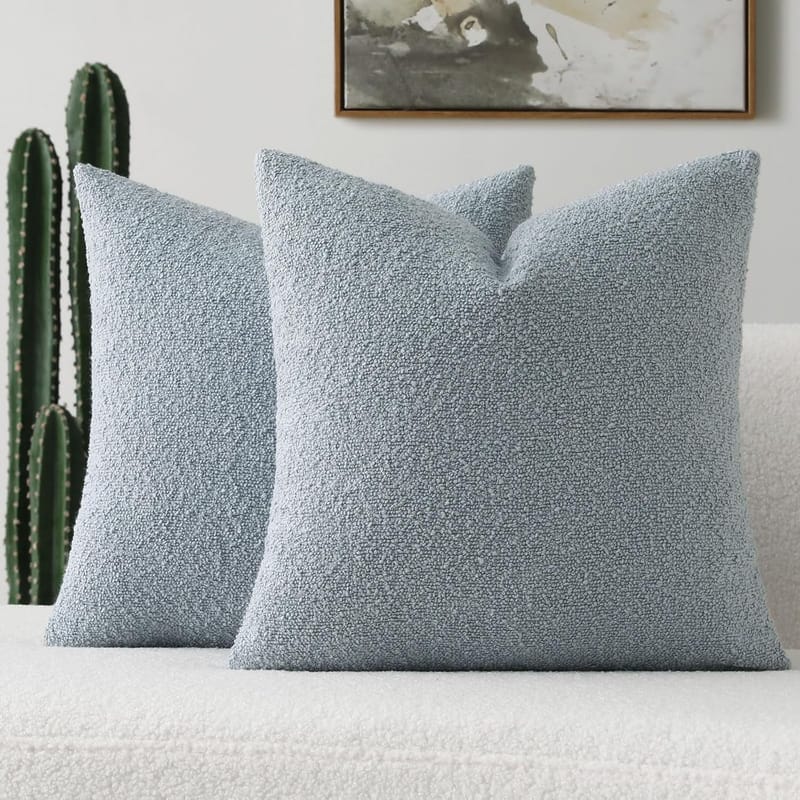 Styling blue throw pillows for bed with current design trends 3