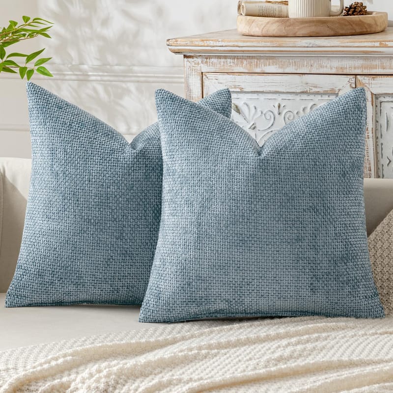 Styling blue throw pillows for bed with current design trends 5
