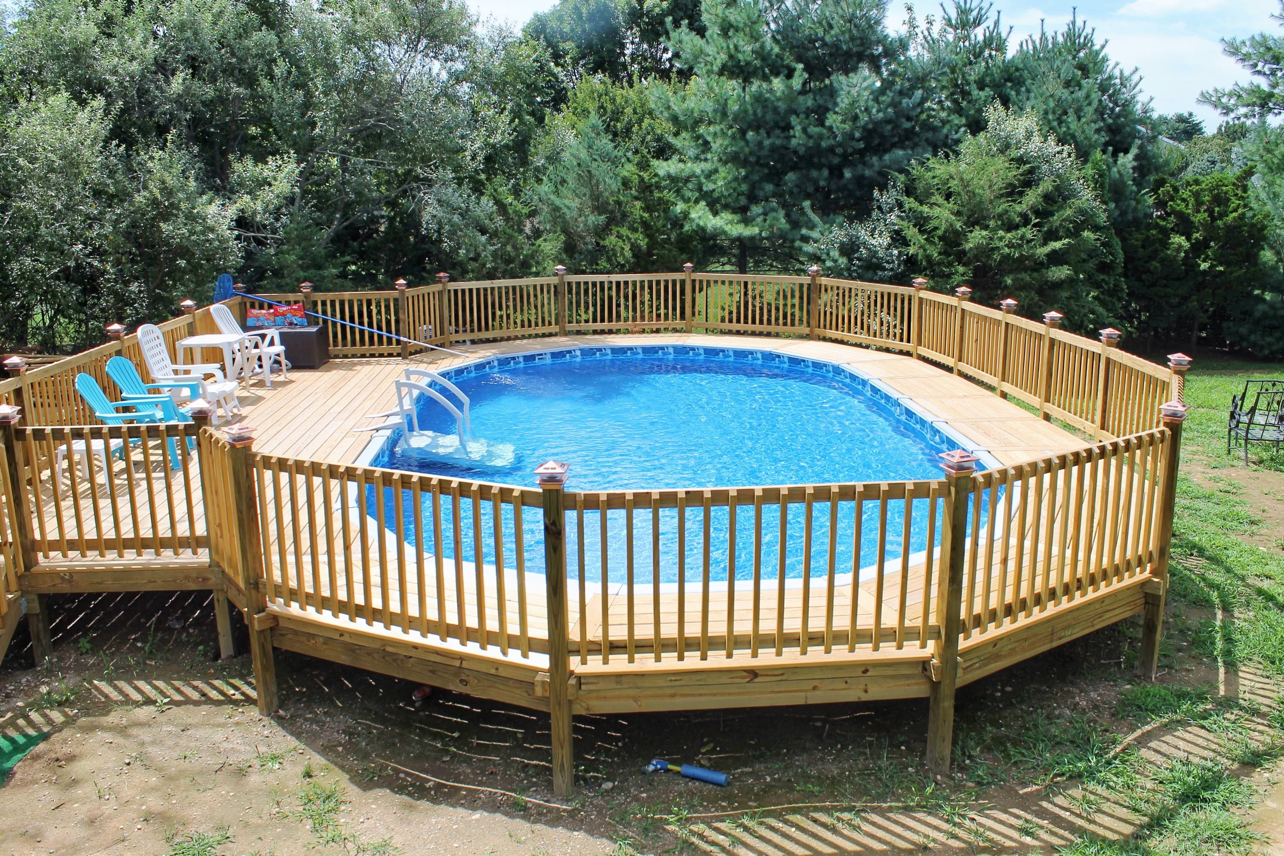 oval above ground pool deck