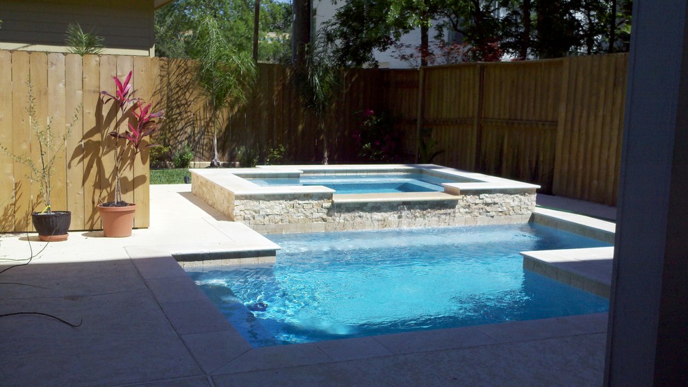 small rectangle pool with hot tub