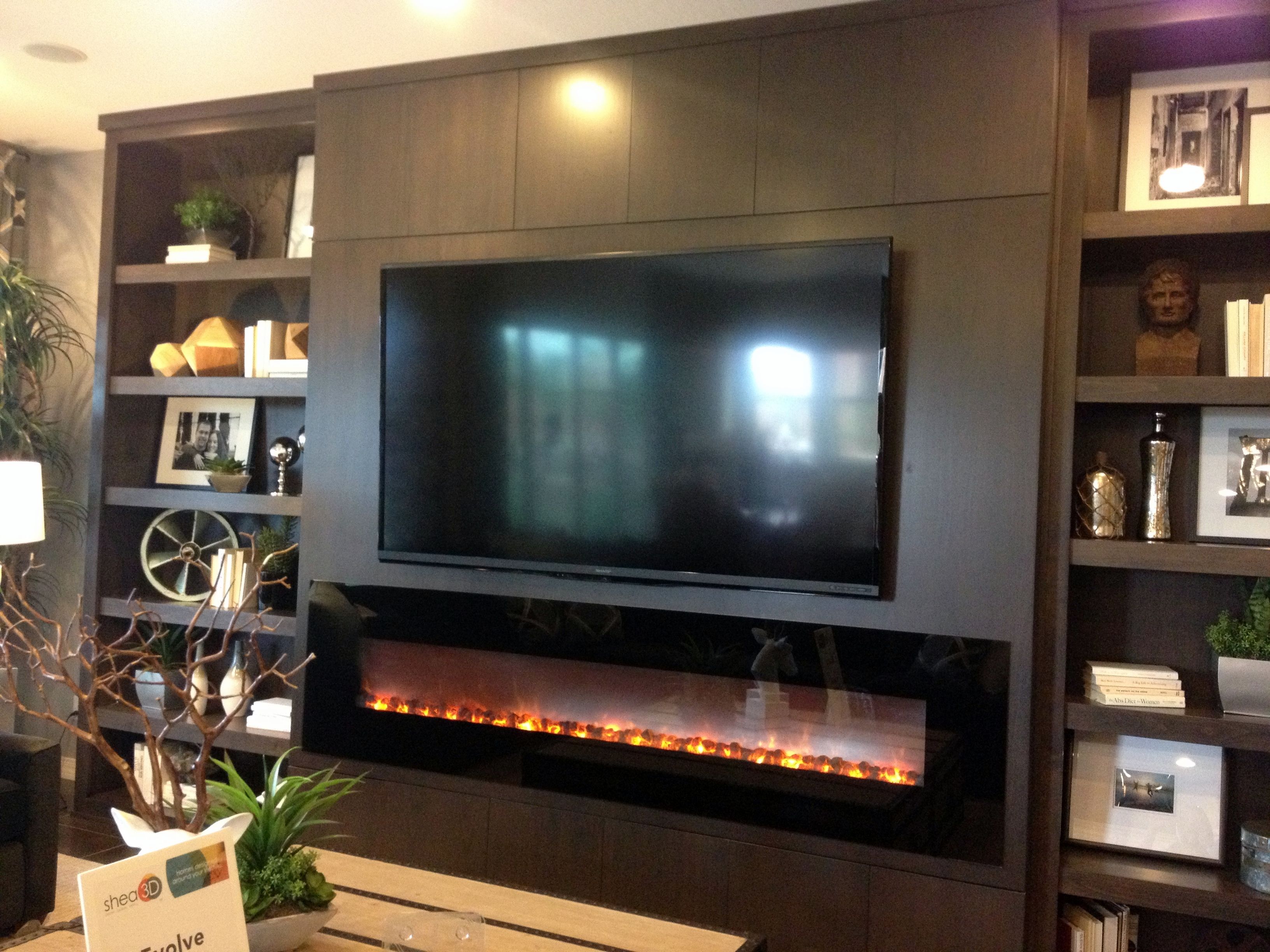 wall entertainment center with fireplace